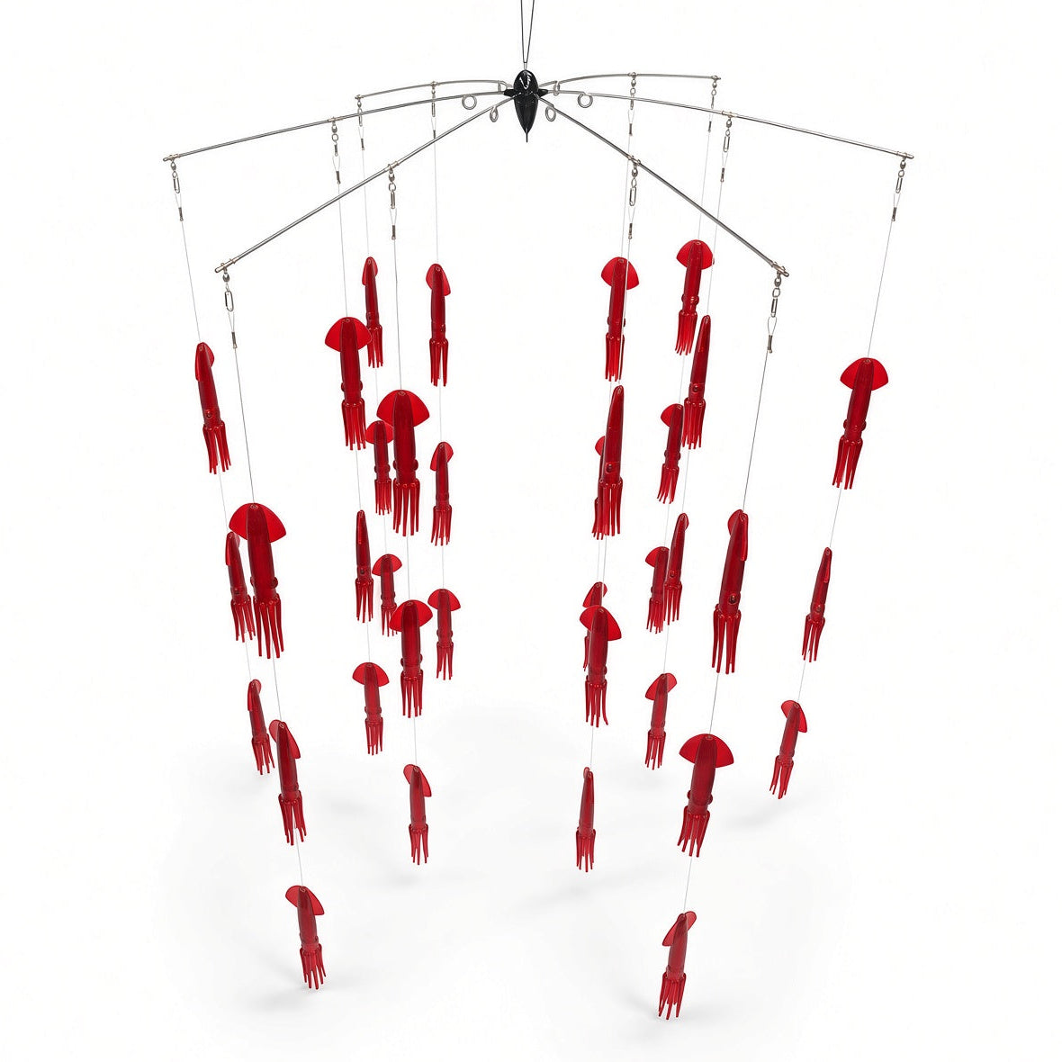 A hanging fishing squid spreader on a clean white background. A black pulley hook suspends a silver multi-arm metal frame, with many glossy red plastic squid lures hanging on clear lines at different lengths. The photo is square and shot from a slight high angle.