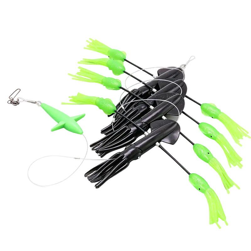 An offshore sail-fishing teaser on a white background, featuring black squid with bright green flippy floppies and a separate green splashing bird rigged on mono, all with a snap swivel on the end to attach a ballyhoo or chugger.